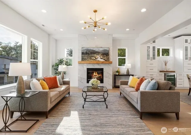 a bed room with furniture and a large window