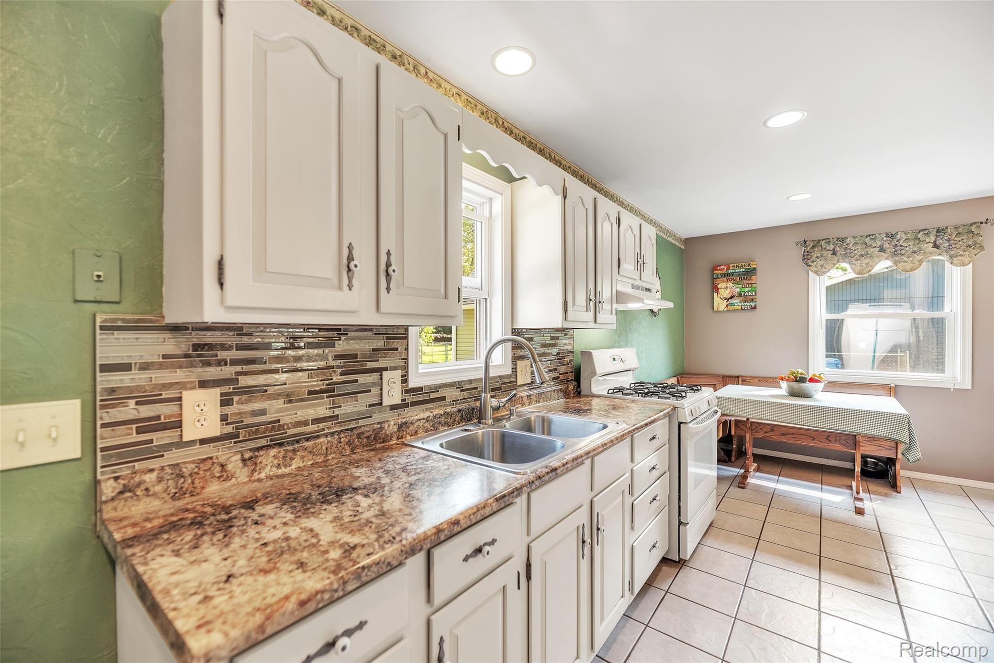 1374 Butler Boulevard Howell, MI 48843 - Photo 15 of 41 19-1374-Butler-Blvd-WindowStill-Rea.jpg