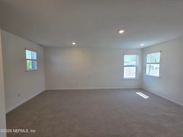 an empty room with windows