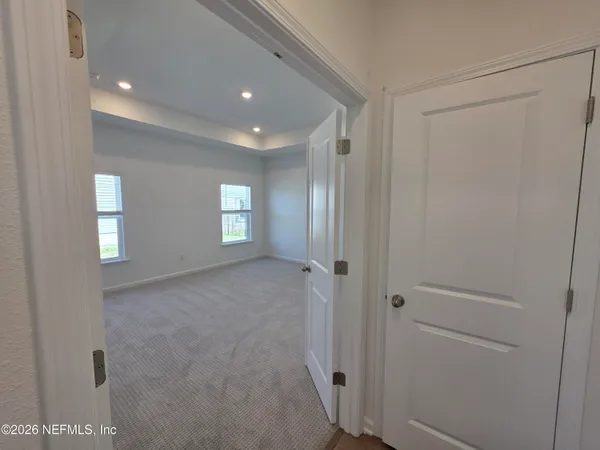 a view of a room with racks on the wall