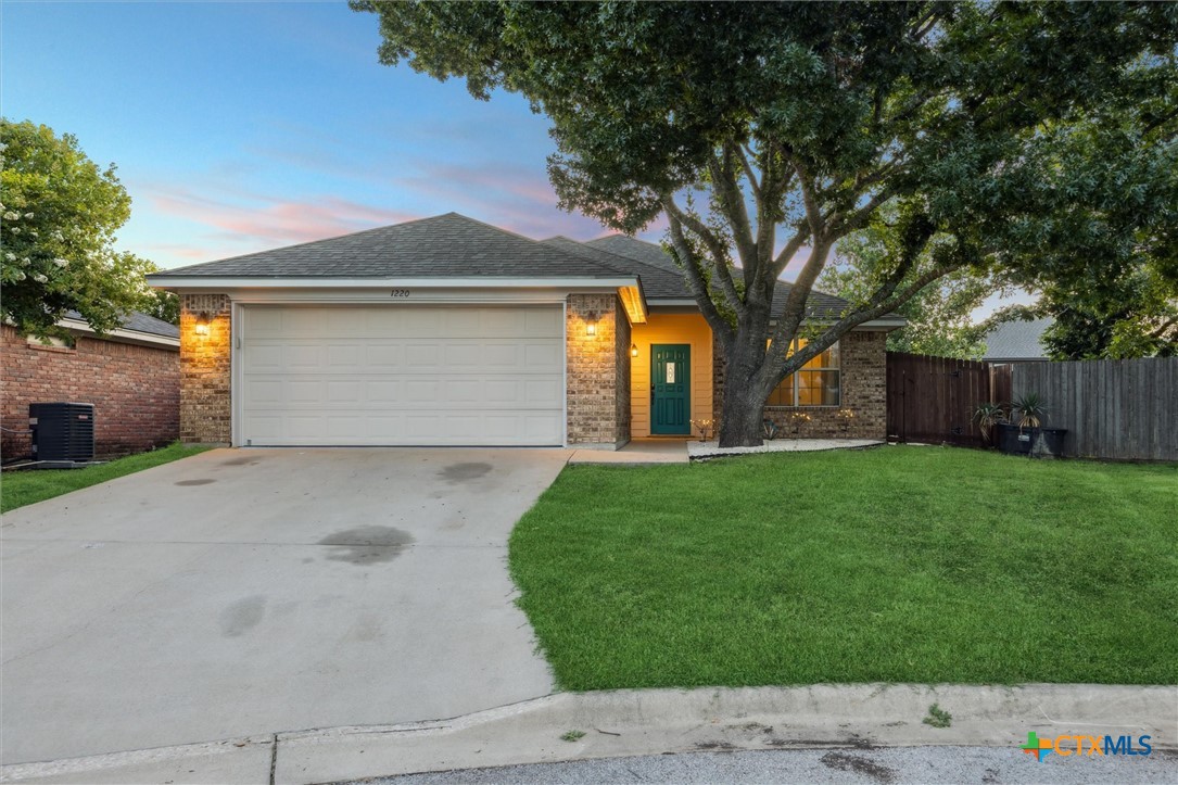 1220 Redstone Drive Temple, TX 76502 - Photo 1 of 35 a front view of house with yard and green space