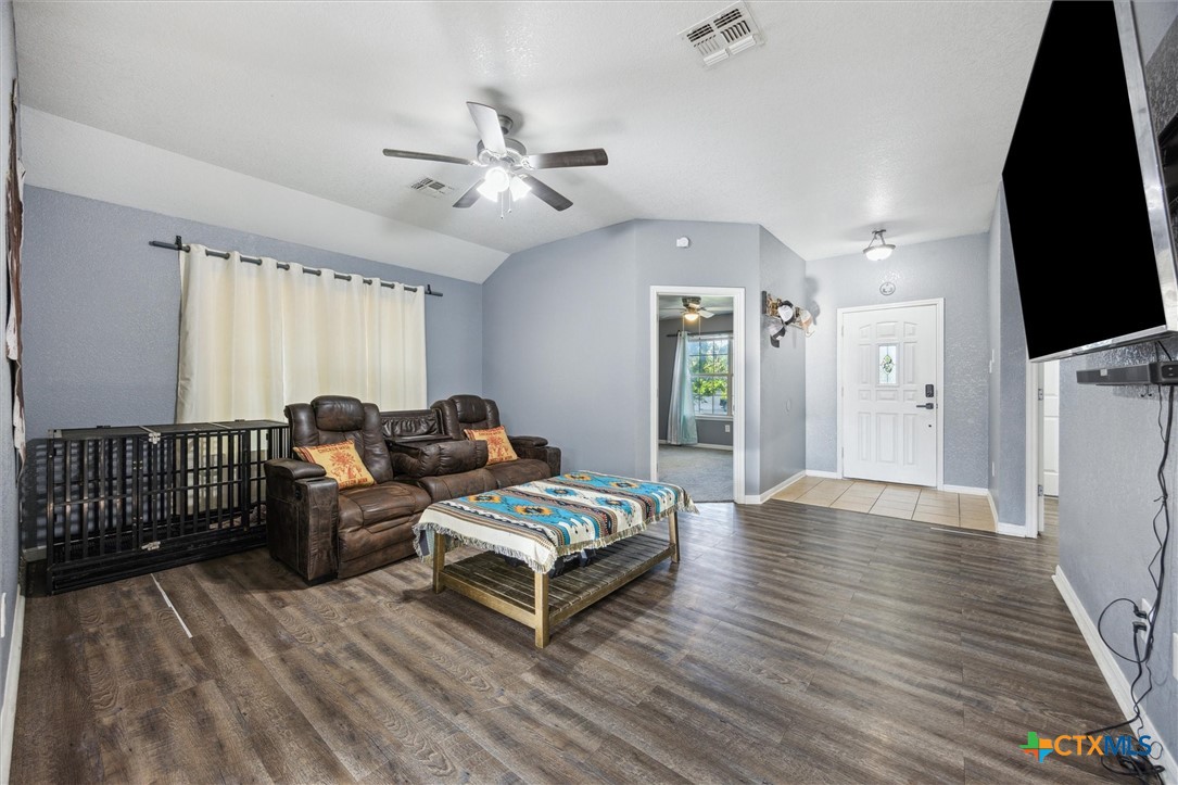 1220 Redstone Drive Temple, TX 76502 - Photo 11 of 35 a spacious bedroom with a bed and a flat screen tv