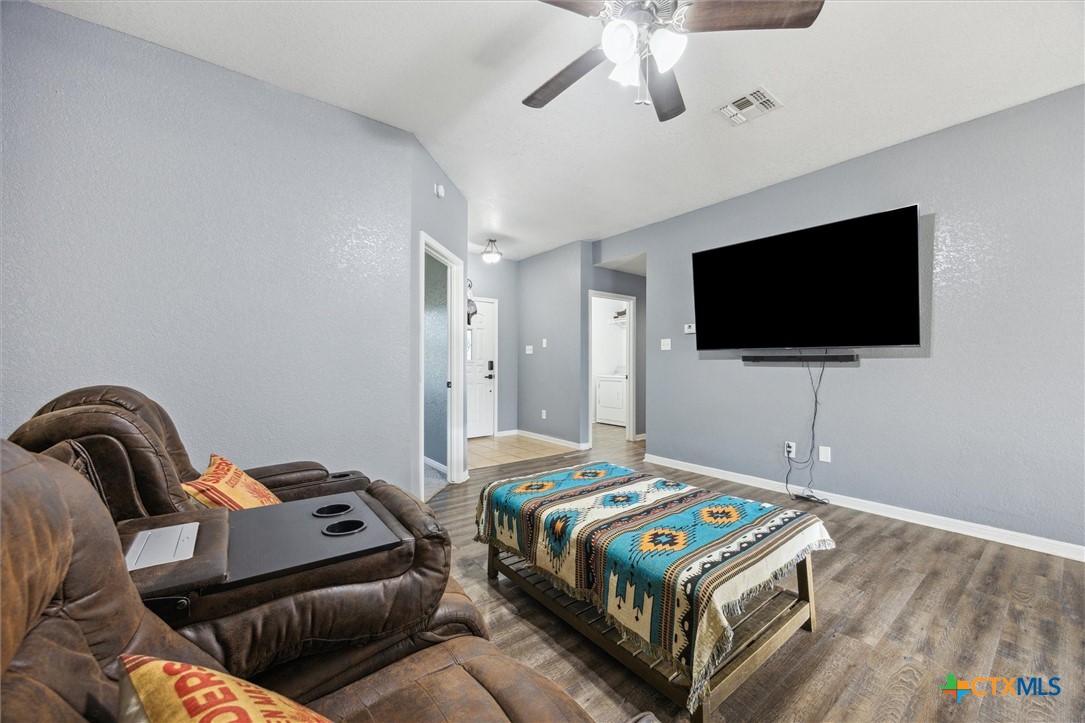 1220 Redstone Drive Temple, TX 76502 - Photo 12 of 35 a bedroom with a bed and flat screen tv