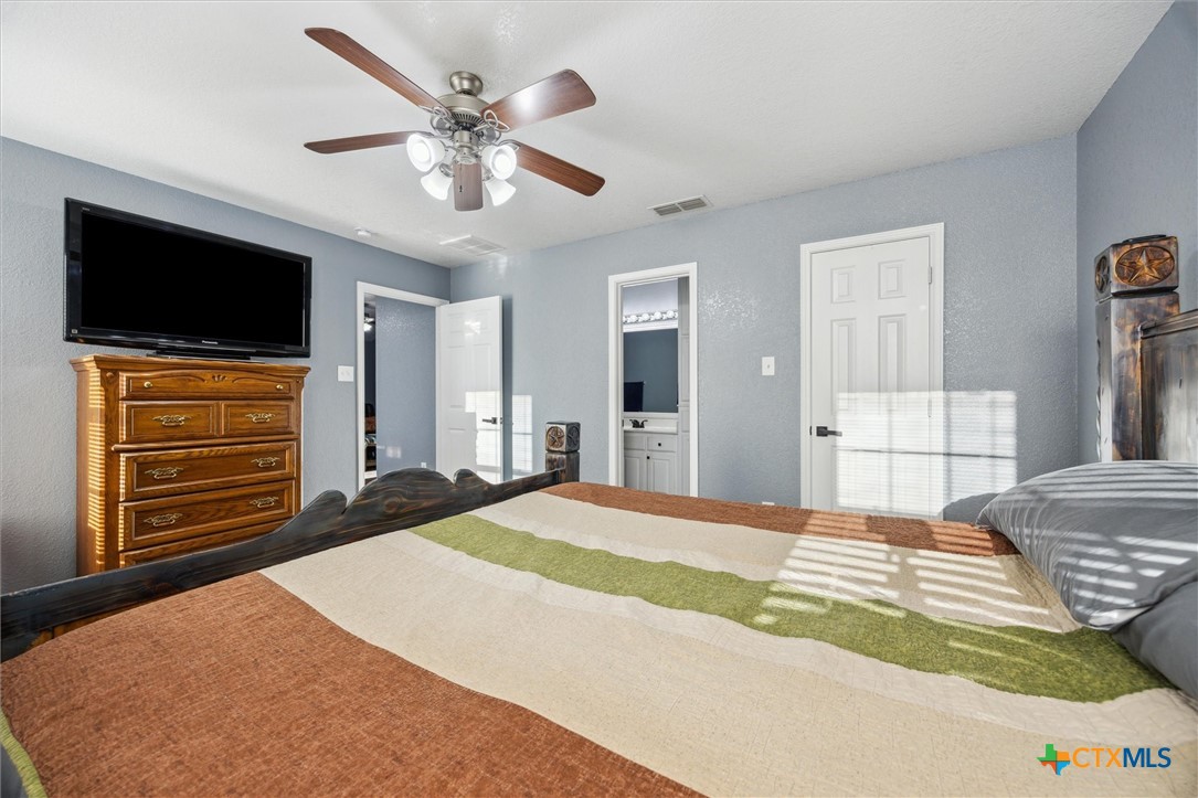 1220 Redstone Drive Temple, TX 76502 - Photo 17 of 35 a bedroom with a bed and a television