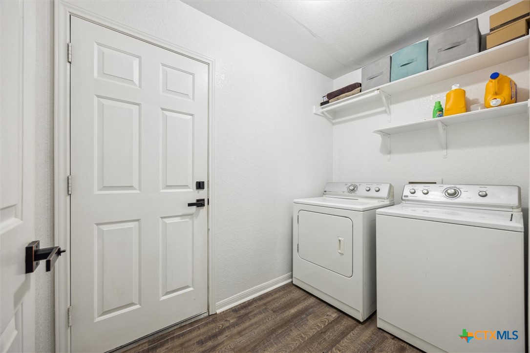 1220 Redstone Drive Temple, TX 76502 - Photo 28 of 35 a view of storage and utility room with washer and dryer