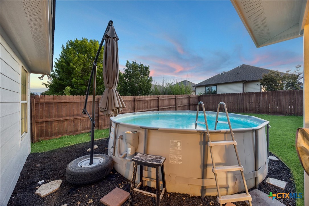 1220 Redstone Drive Temple, TX 76502 - Photo 34 of 35 a view of a backyard with sitting area