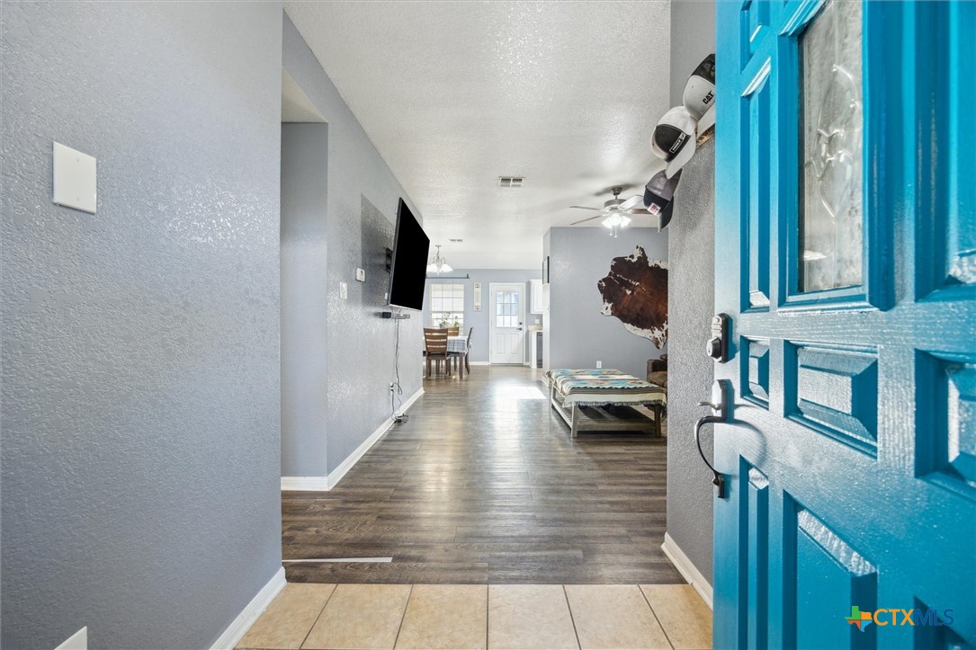 1220 Redstone Drive Temple, TX 76502 - Photo 6 of 35 a hallway with a large window and entryway