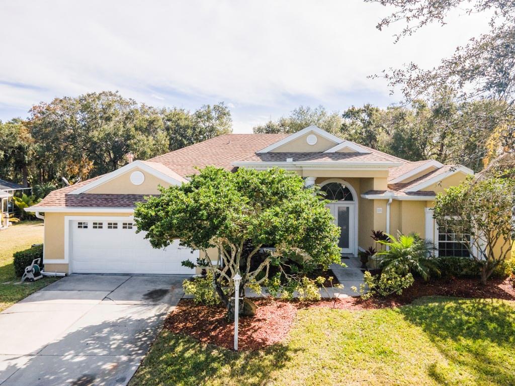 11331 Rivers Bluff Circle Lakewood Ranch, FL 34202 - Photo 1 of 1 a view of a house with garden and plants