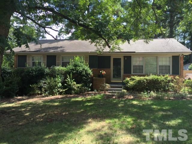 140 East Rowan Street Raleigh, NC 27609 - Photo 1 of 4 a view of a house with a yard