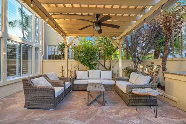 a view of a terrace with sitting area