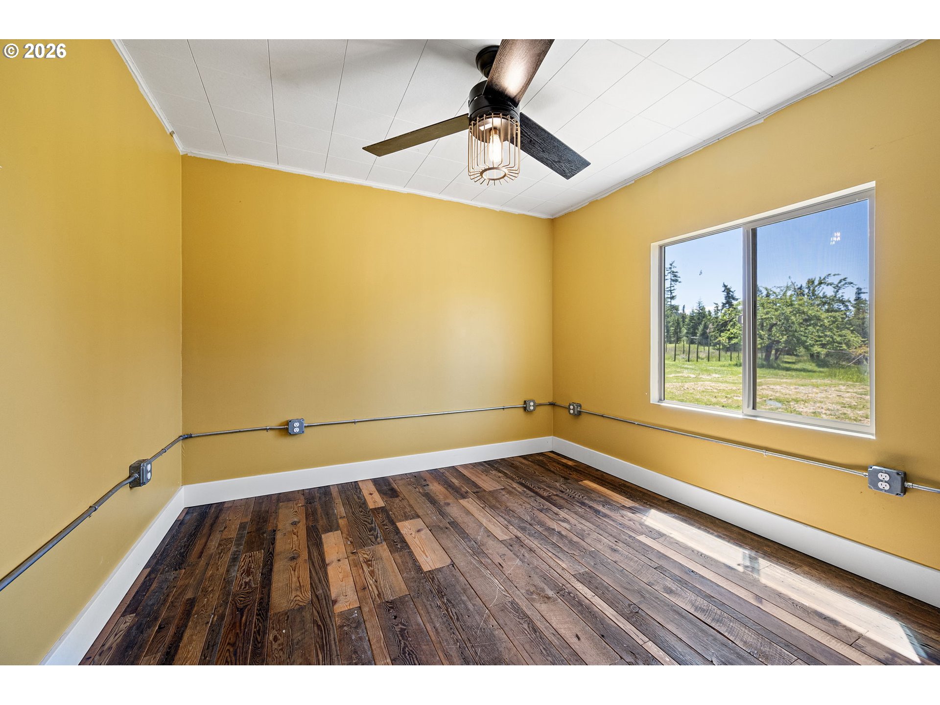 77521 Brock Road Oakridge, OR 97463 - Photo 19 of 48 a view of an empty room with a window