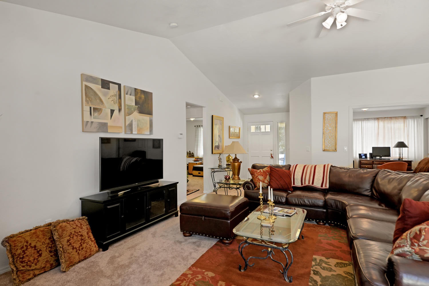 52311 Ammon Road La Pine, OR 97739 - Photo 9 of 39 a living room with furniture and a flat screen tv