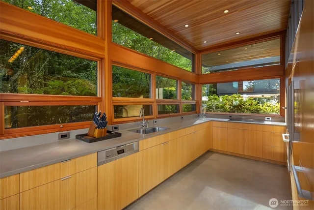 a view of a living room with a large window
