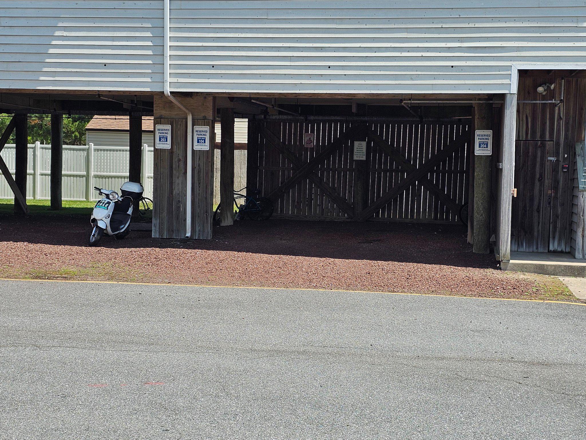 39634 Jefferson Bridge Road, Unit 203 Bethany Beach, DE 19930 - Photo 2 of 6 Personal covered parking