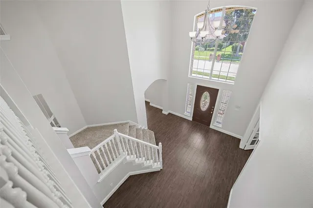 a view of entryway with wooden floor