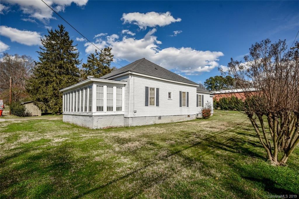 504 Watson Street Davidson, NC 28036 - Photo 13 of 35 a view of a house with a yard