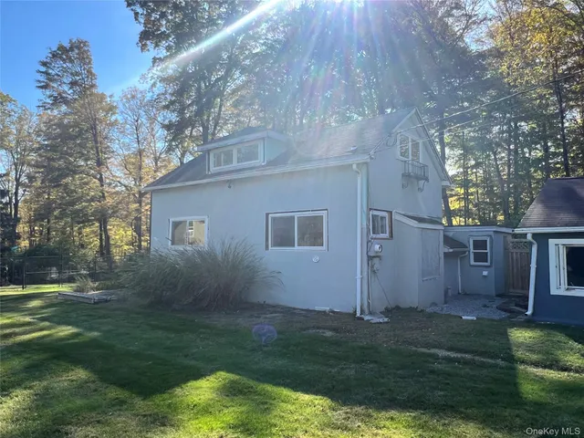 a view of backyard with garden and plants