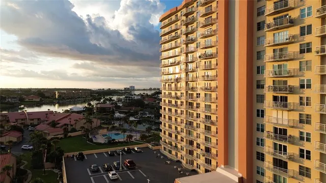 a view of a city with a lake