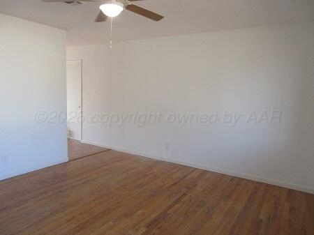 4416 South Hayden Street Amarillo, TX 79110 - Photo 2 of 14 a view of an empty room with a chandelier fan