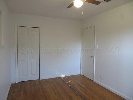 4416 South Hayden Street Amarillo, TX 79110 - Photo 7 of 14 a view of an empty room with a fan