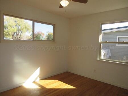 4416 South Hayden Street Amarillo, TX 79110 - Photo 8 of 14 a view of empty room with window