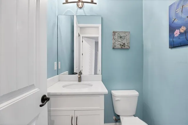 a view of workspace with wooden floor and window
