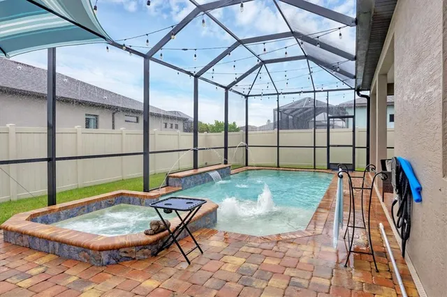 a view of a garden with a building in the background