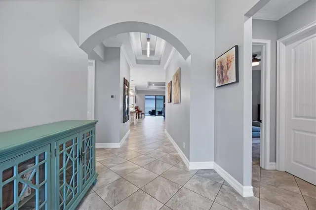 a view of a hallway view with staircase