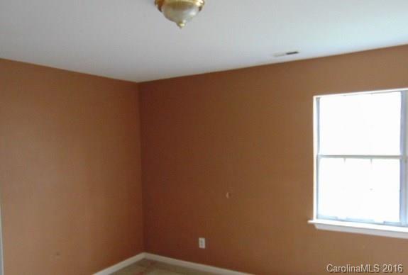 10303 Rockwood Road Charlotte, NC 28215 - Photo 11 of 12 a view of an empty room