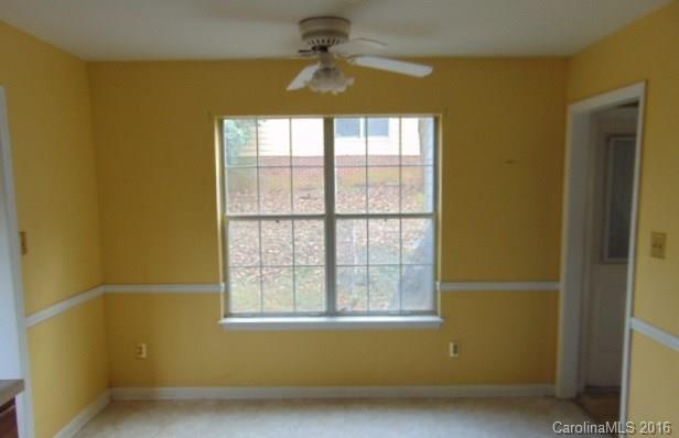 10303 Rockwood Road Charlotte, NC 28215 - Photo 7 of 12 an empty room with a window