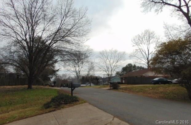 10303 Rockwood Road Charlotte, NC 28215 - Photo 10 of 12 a view of road with with trees