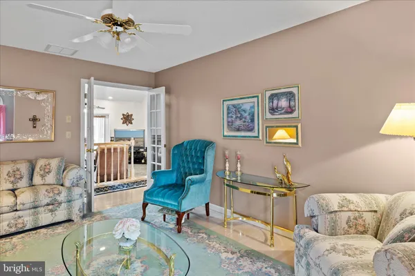 a bedroom with a bed and a table