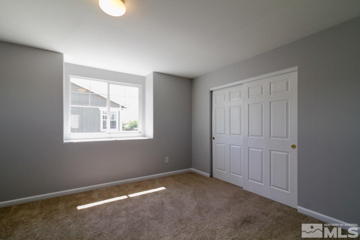 8903 Wynne Street Reno, NV 89506 - Photo 13 of 17 an empty room with windows
