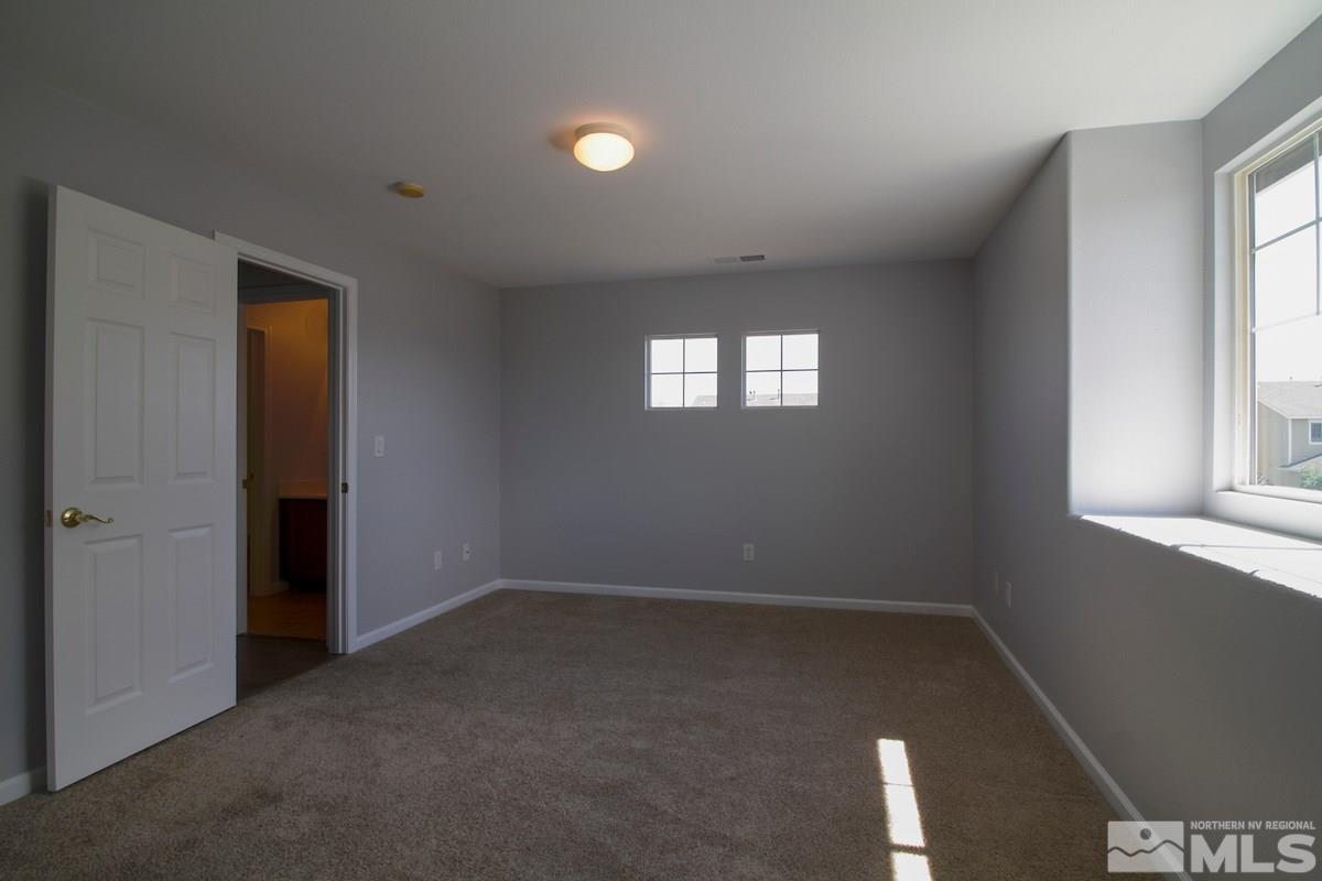 8903 Wynne Street Reno, NV 89506 - Photo 14 of 17 an empty room with windows