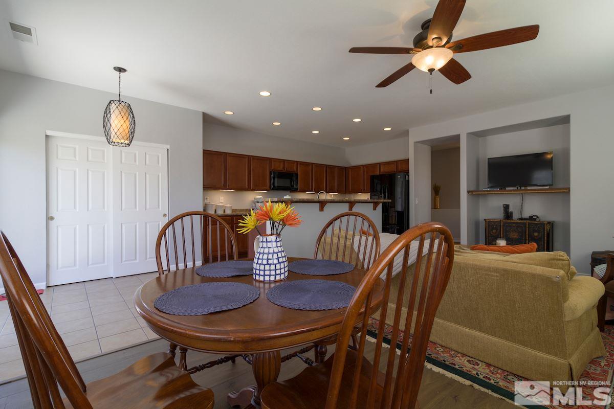 8903 Wynne Street Reno, NV 89506 - Photo 6 of 17 a view of a dining room with furniture