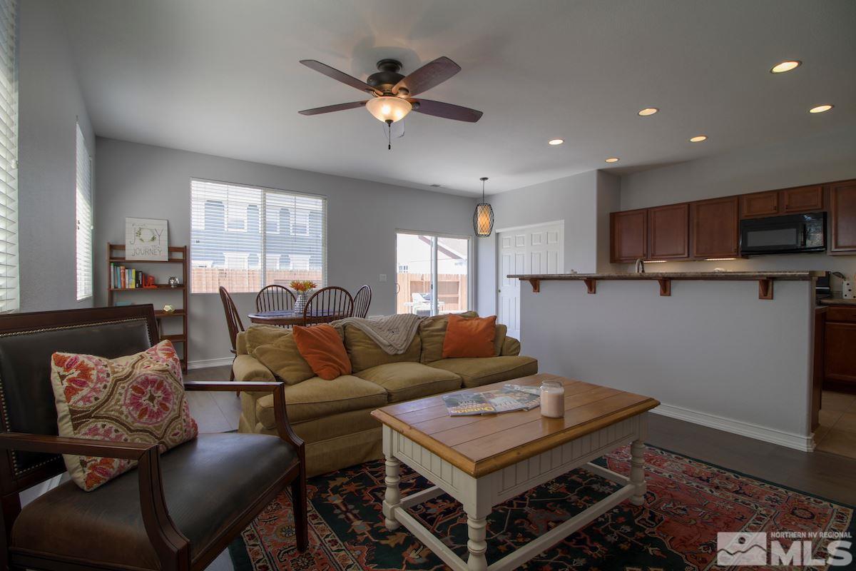8903 Wynne Street Reno, NV 89506 - Photo 7 of 17 a living room with furniture and a wooden floor