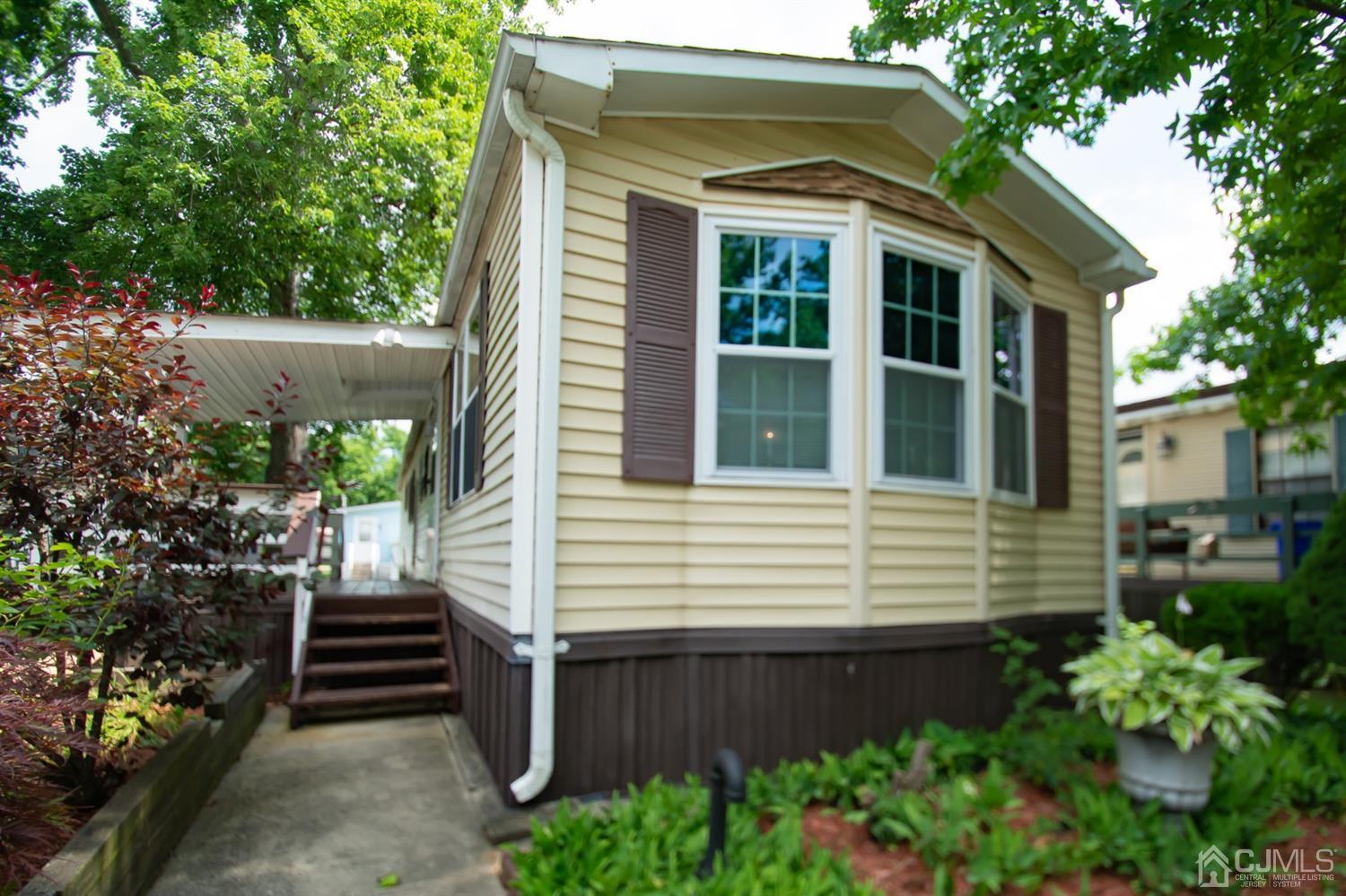 47 Poe Road North Brunswick, NJ 08902 - Photo 2 of 19 a view of a house with a yard