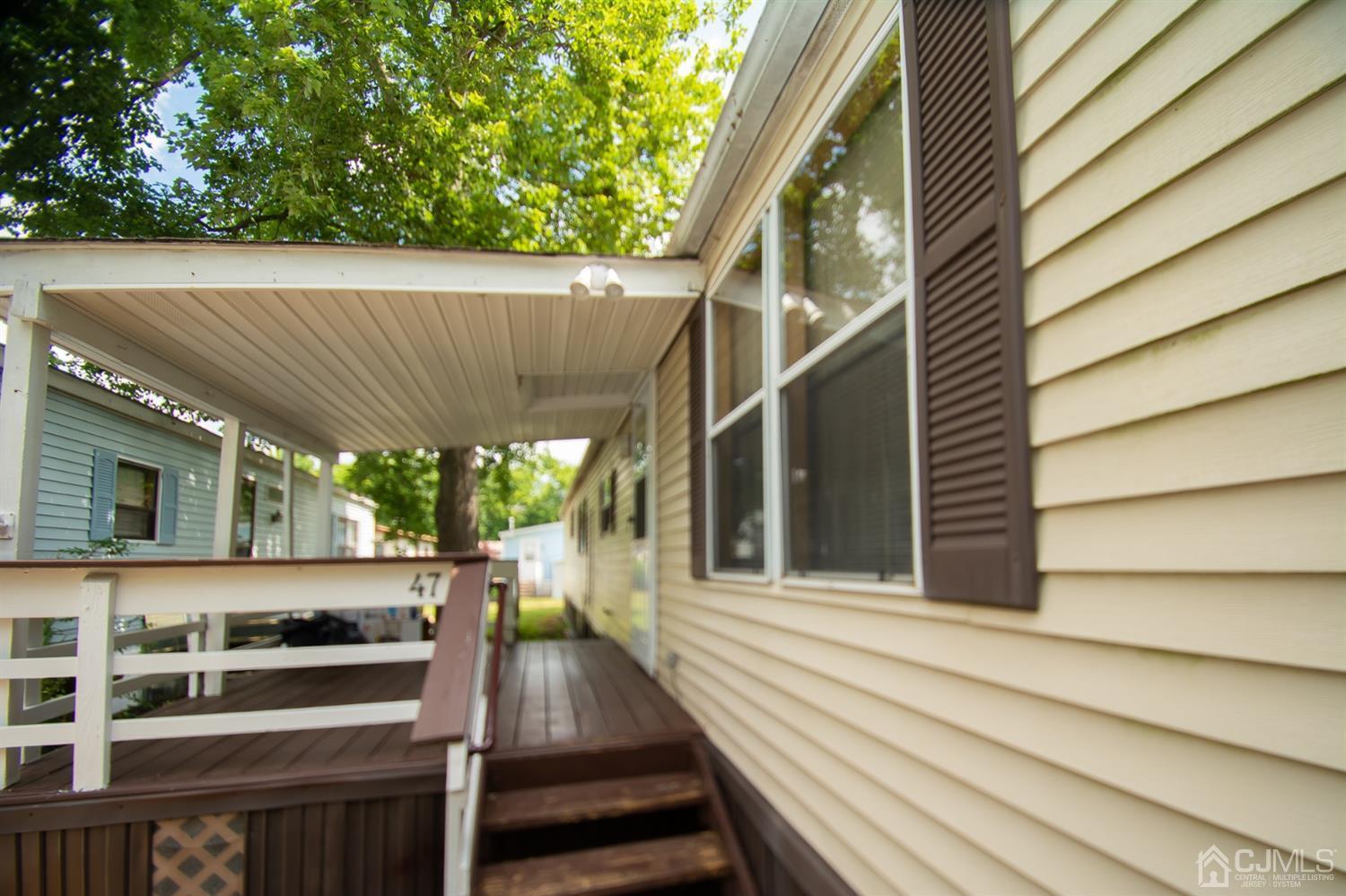 47 Poe Road North Brunswick, NJ 08902 - Photo 3 of 19 a view of a house with a large window