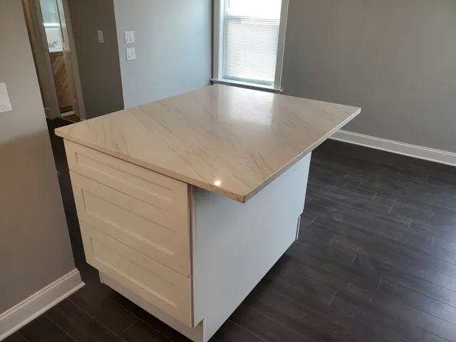 an entryway with wooden floor