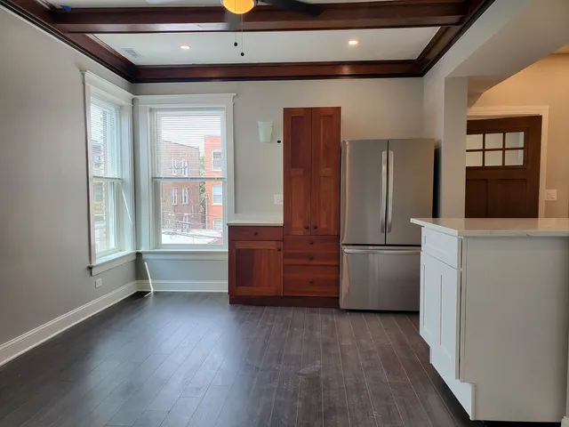 a room with furniture and wooden floor