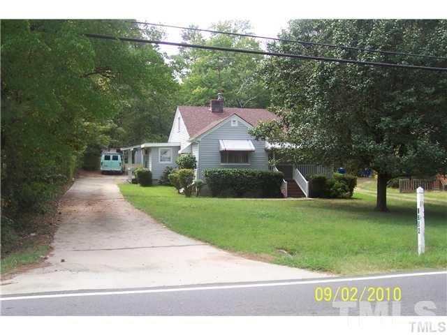 2304 Cheek Road Durham, NC 27704 - Photo 1 of 8 a front view of a house with a yard
