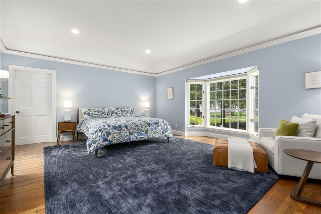 12 Pheasant Landing Road Needham, MA 02492 - Photo 21 of 42 a bedroom with a bed and a couch