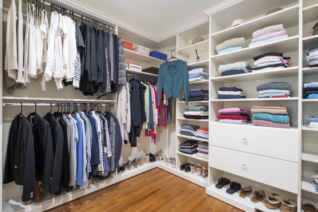 12 Pheasant Landing Road Needham, MA 02492 - Photo 25 of 42 a view of walk in closet with clothes and shoes