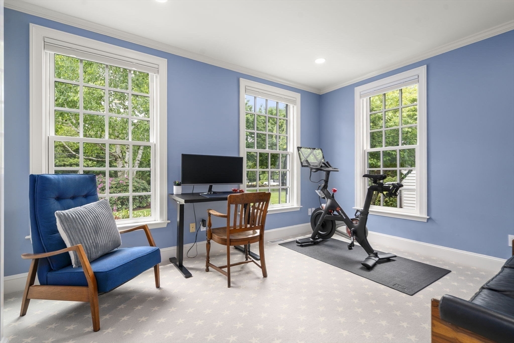 12 Pheasant Landing Road Needham, MA 02492 - Photo 27 of 42 a view of a livingroom with workspace and a window
