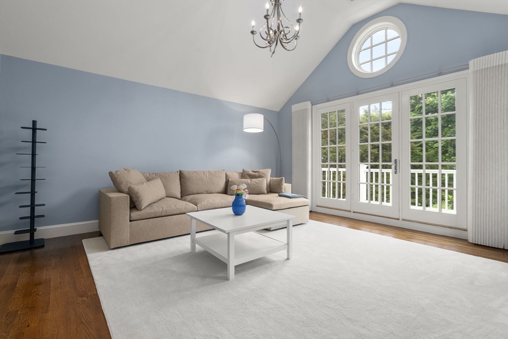 12 Pheasant Landing Road Needham, MA 02492 - Photo 29 of 42 a living room with furniture and a large window