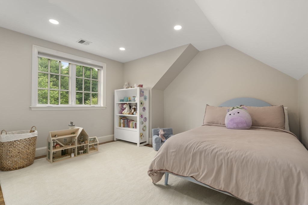 12 Pheasant Landing Road Needham, MA 02492 - Photo 33 of 42 a bedroom with a bed and a window