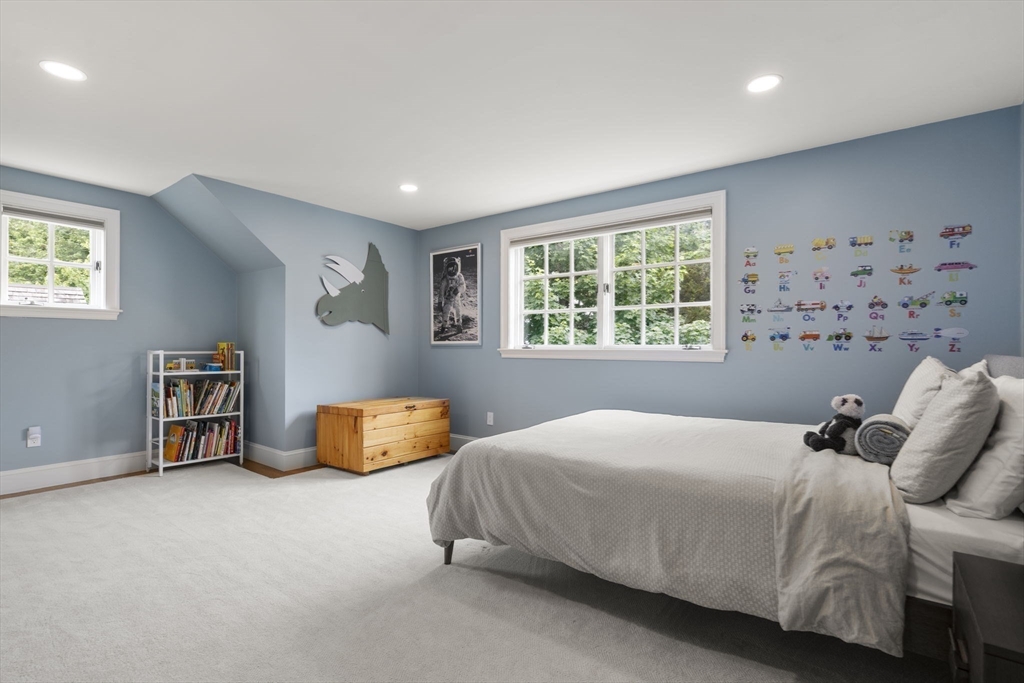 12 Pheasant Landing Road Needham, MA 02492 - Photo 34 of 42 a bedroom with a bed and a dresser