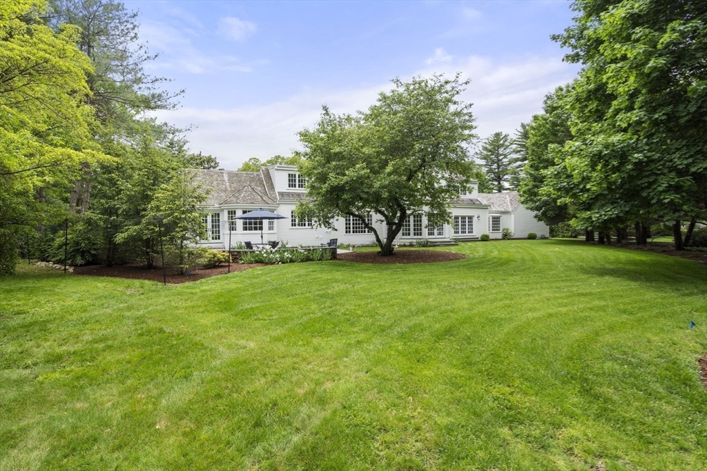 12 Pheasant Landing Road Needham, MA 02492 - Photo 41 of 42 a view of house with backyard and trees