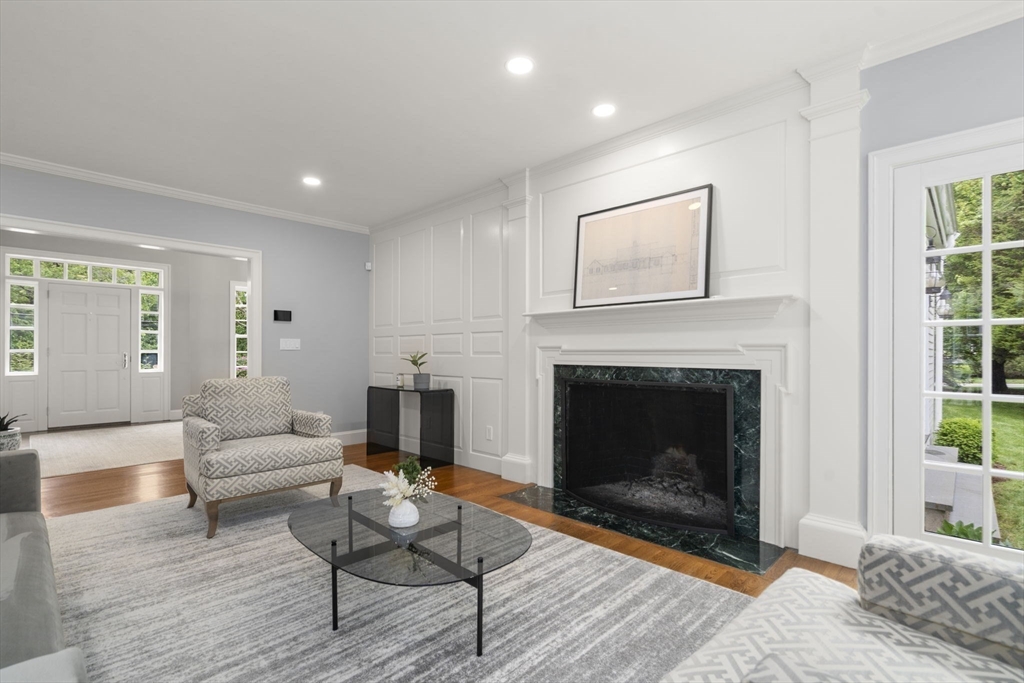 12 Pheasant Landing Road Needham, MA 02492 - Photo 6 of 42 a living room with furniture and a fireplace