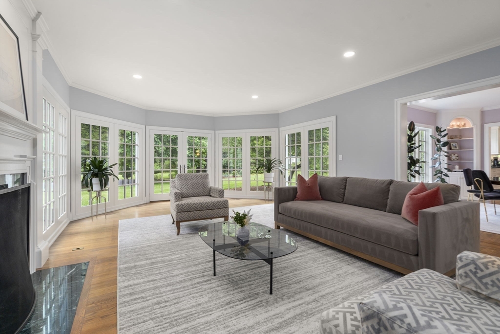 12 Pheasant Landing Road Needham, MA 02492 - Photo 7 of 42 a living room with furniture and a large window